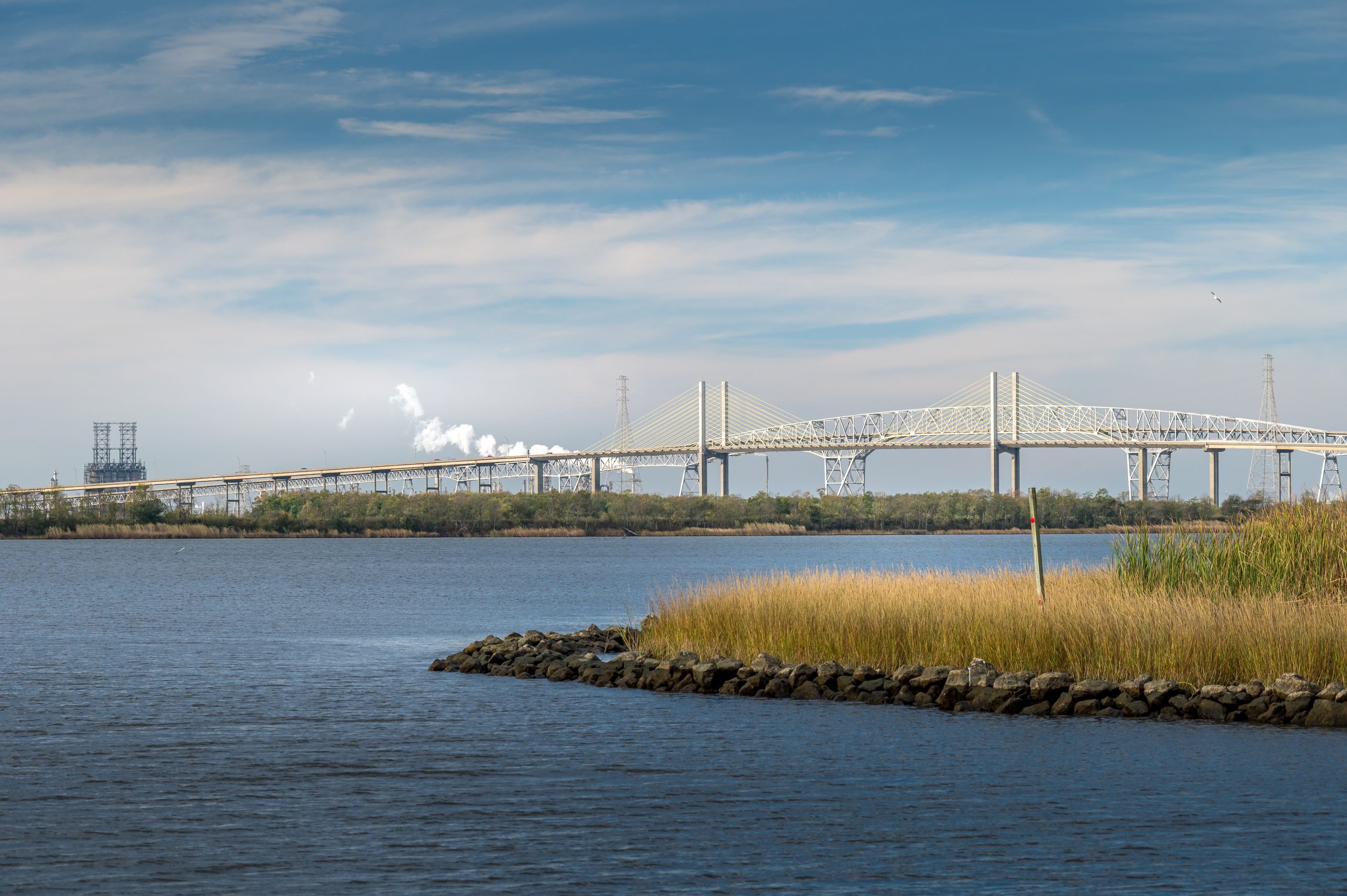 Skyline view of large bridge in Orange, Texas overlooking the water